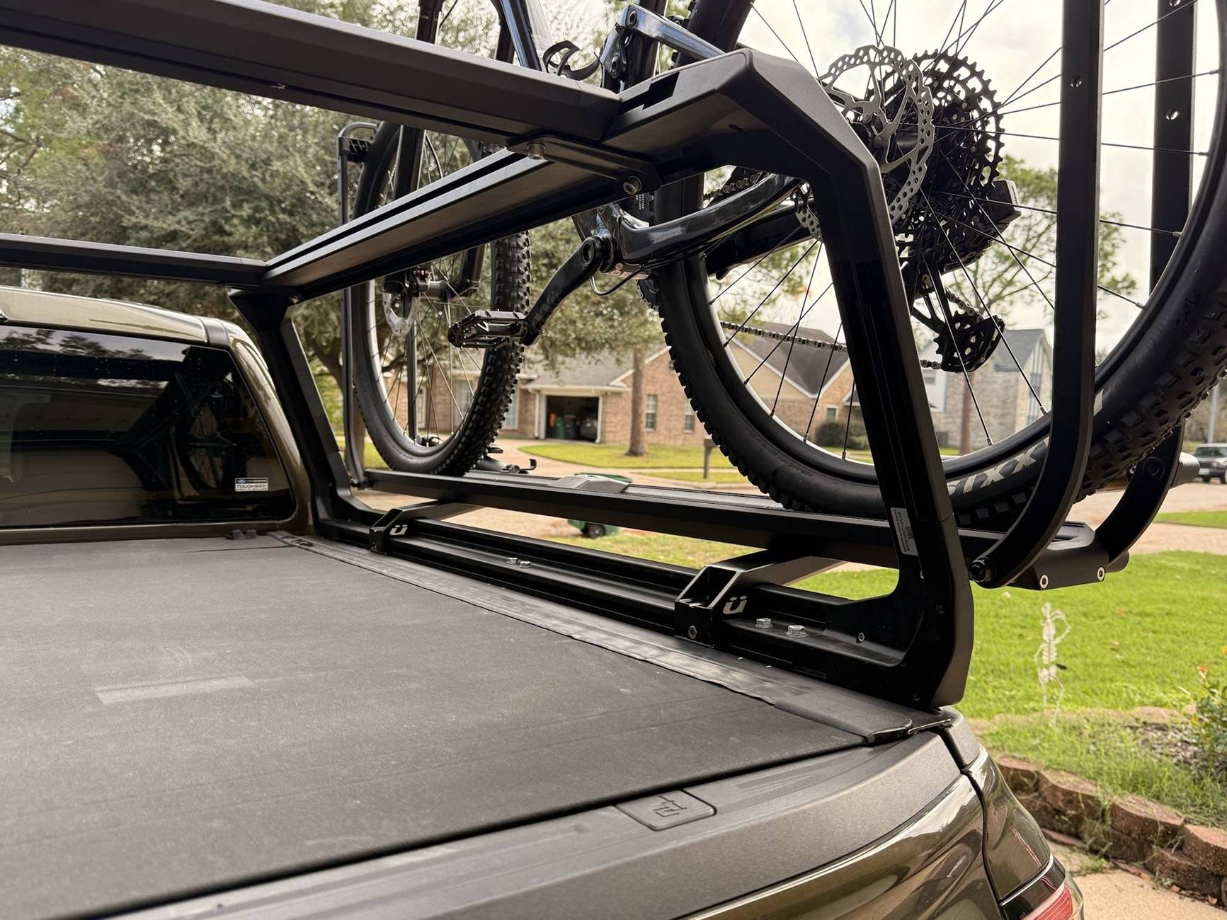 2024 Tacoma Back racks compatible with OEM hard tri-fold cover? 1zhDSnQ