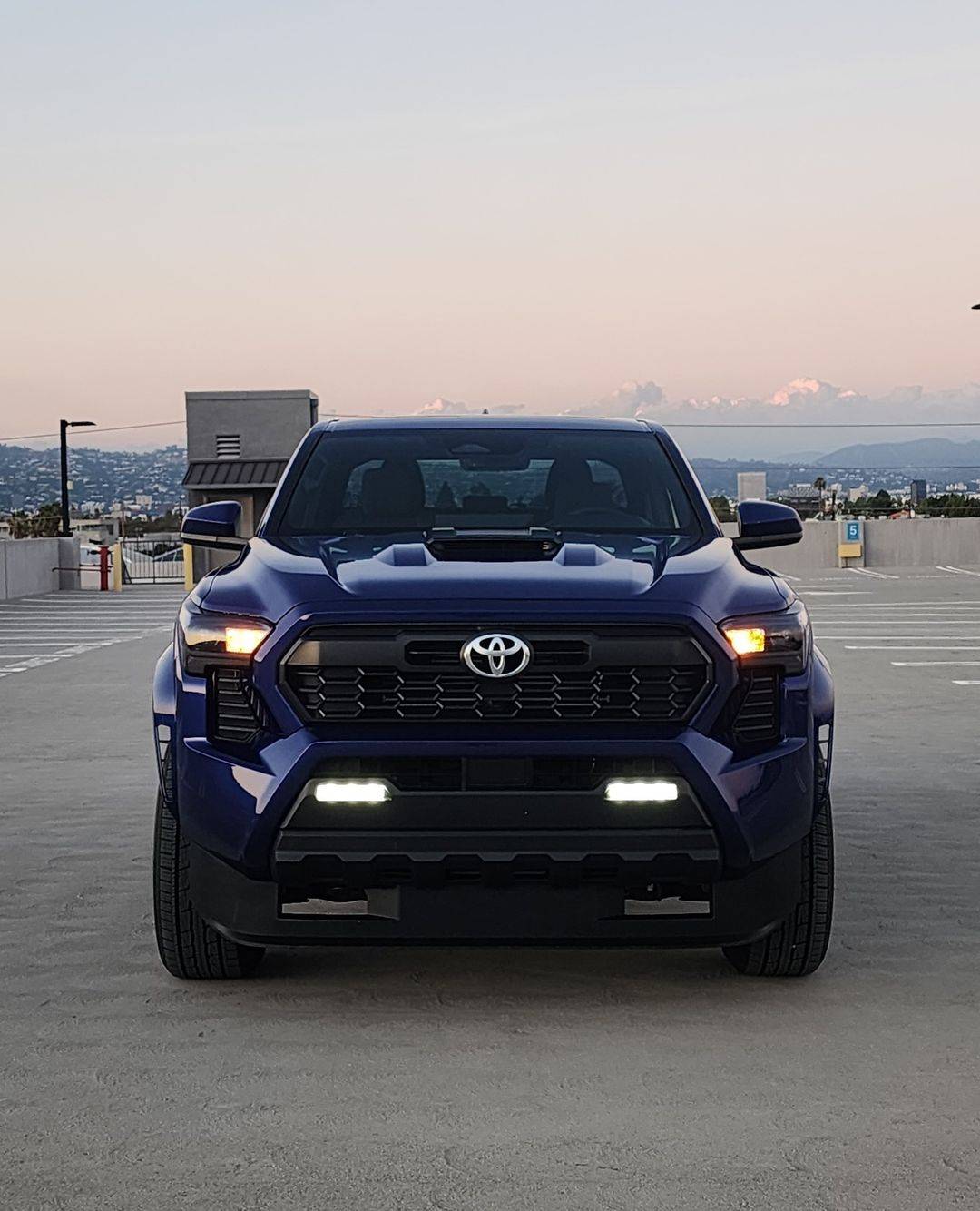 2024 Tacoma 3rd gen vs. 4th gen Tacoma TRD Sport side-by-side comparison look 2024 Toyota Tacoma TRD Sport 4th gen vs. 2023 3rd gen 7