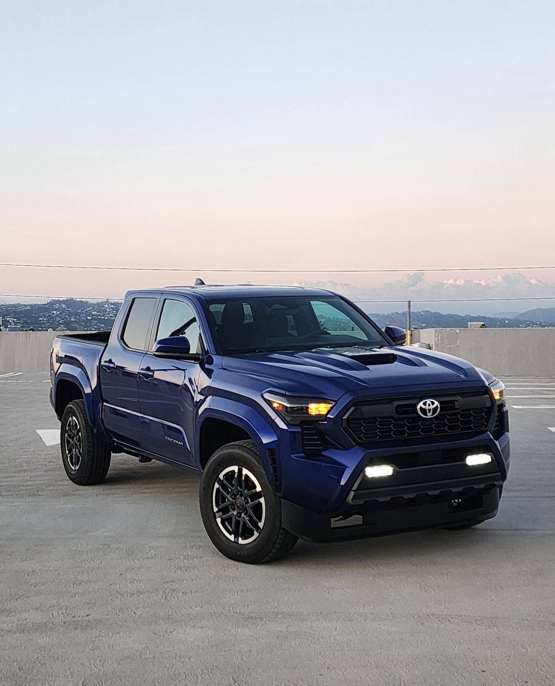 2024 Tacoma 3rd gen vs. 4th gen Tacoma TRD Sport side-by-side comparison look 2024 Toyota Tacoma TRD Sport 4th gen vs. 2023 3rd gen 8