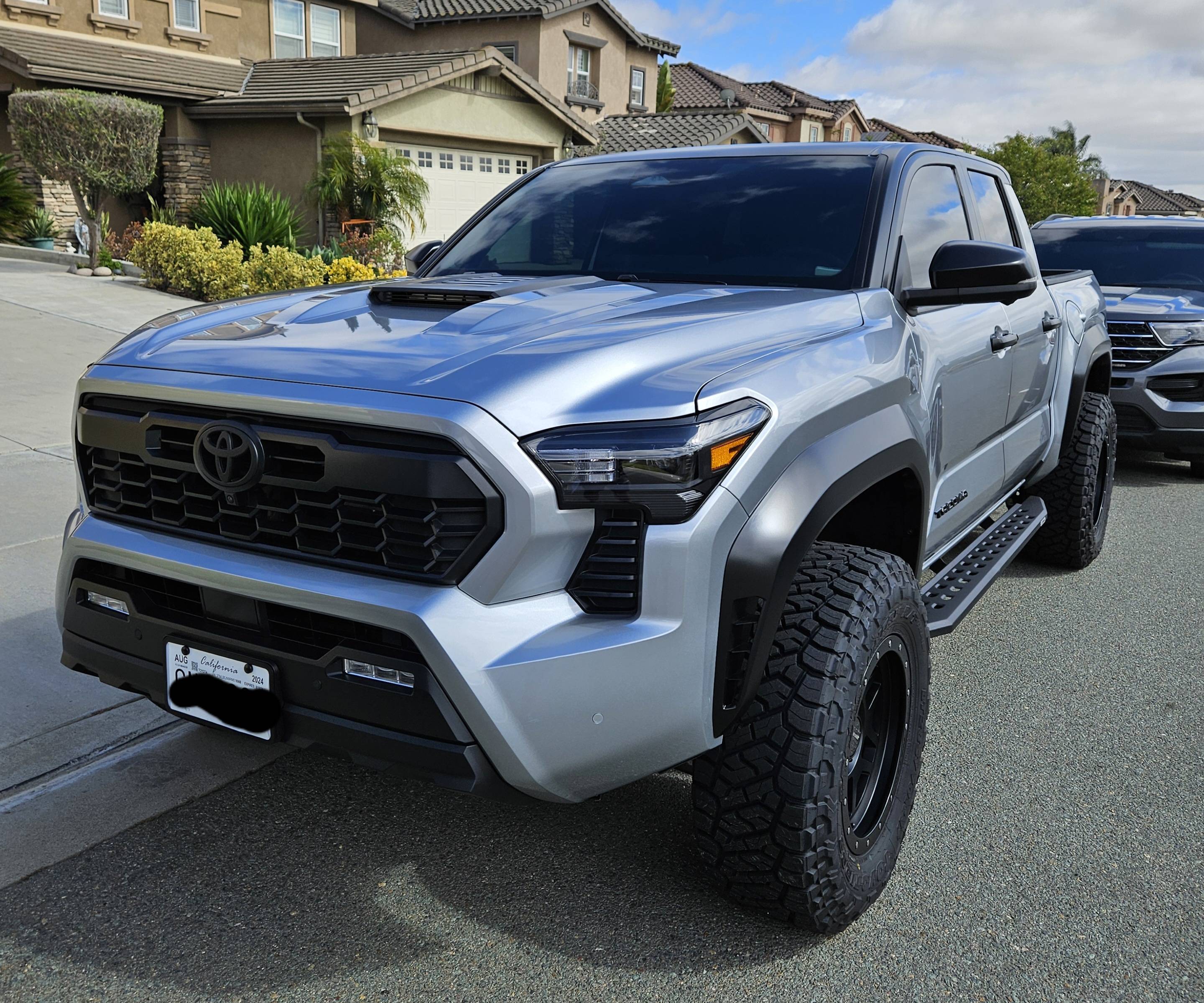 2024 Tacoma 2024 TRD Sport Silver with TRD Pro style Satin Black Wrap on Roof, Pillars, Mirror, Fender Flares 20240525_160005