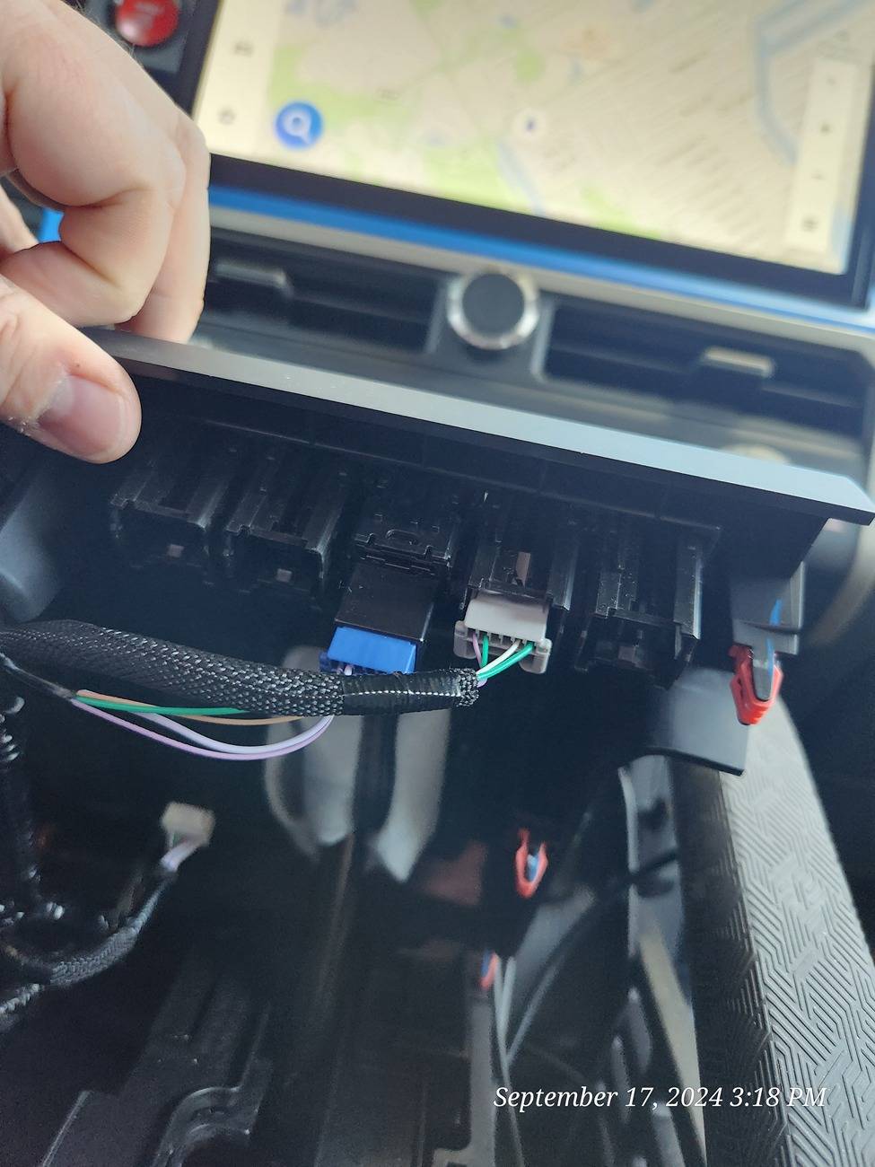 2024 Tacoma What are these two plugs in my Aux switch row? 20240917_151850