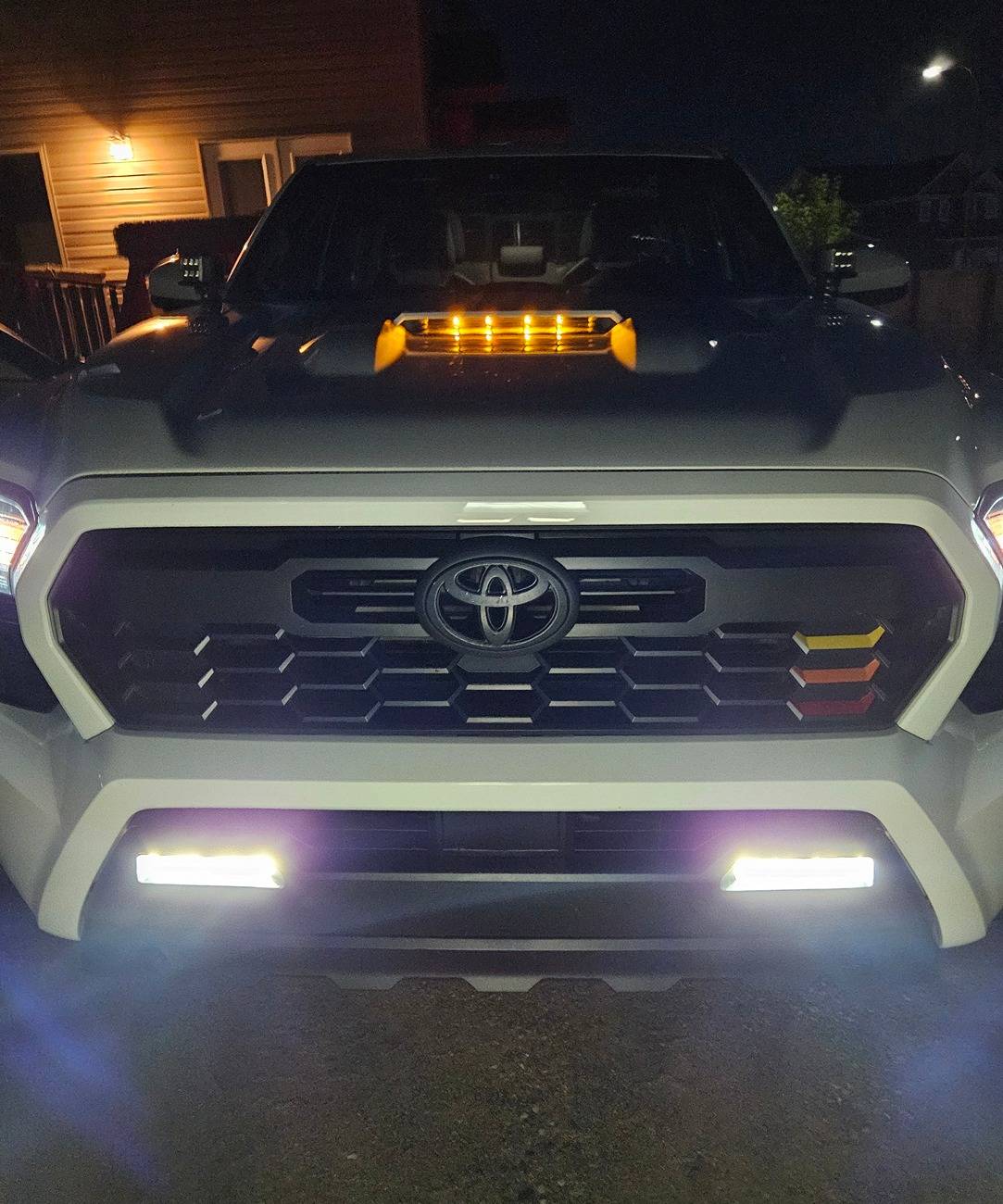 2024 Tacoma Raptor style amber lights in hood scoop 20240917_204542