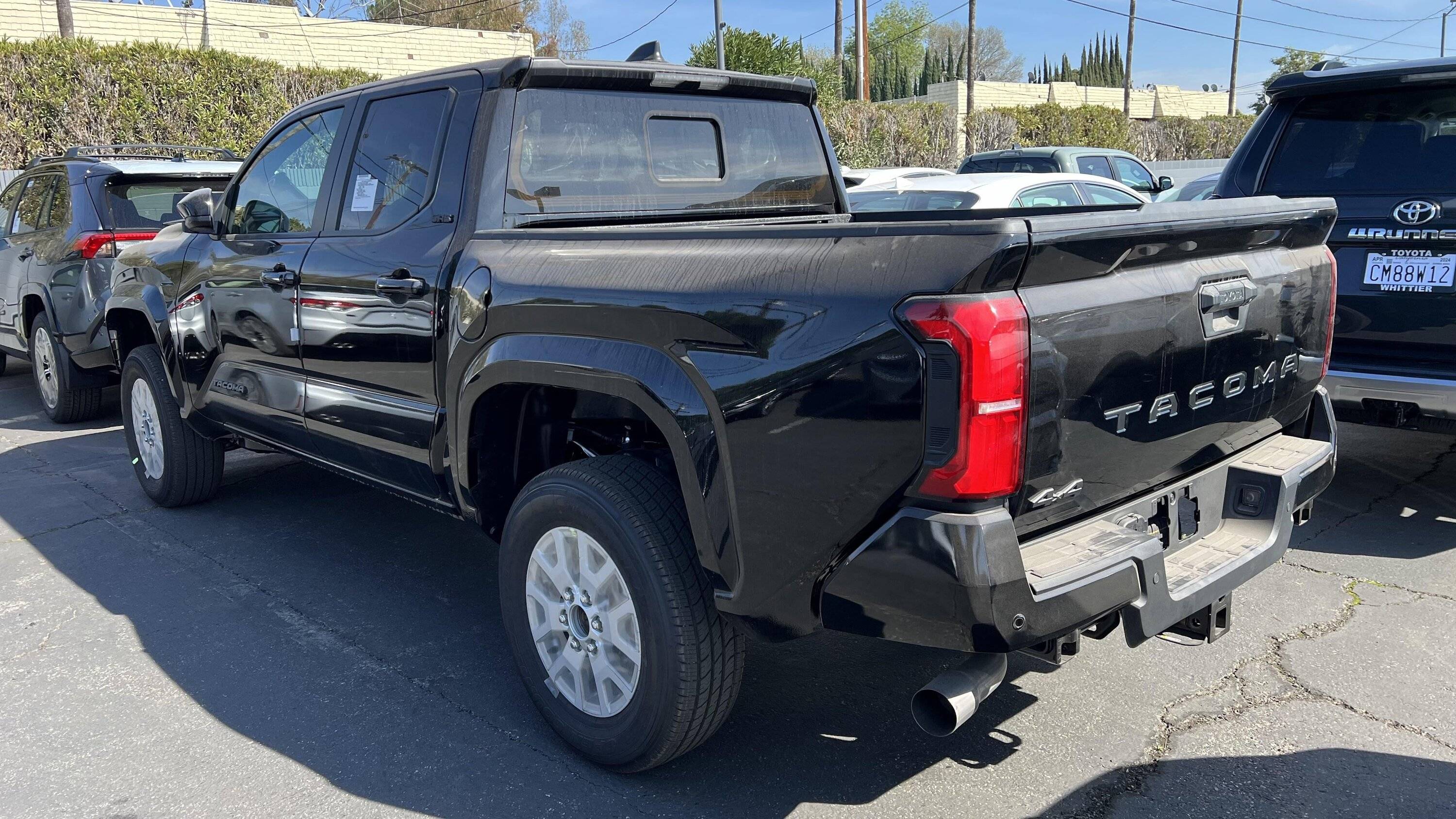 2024 Tacoma Black 2024 Tacoma SR5 at Toyota Whittier, CA (exterior & interior w/ small screen) Black 2024 Tacoma SR5 1