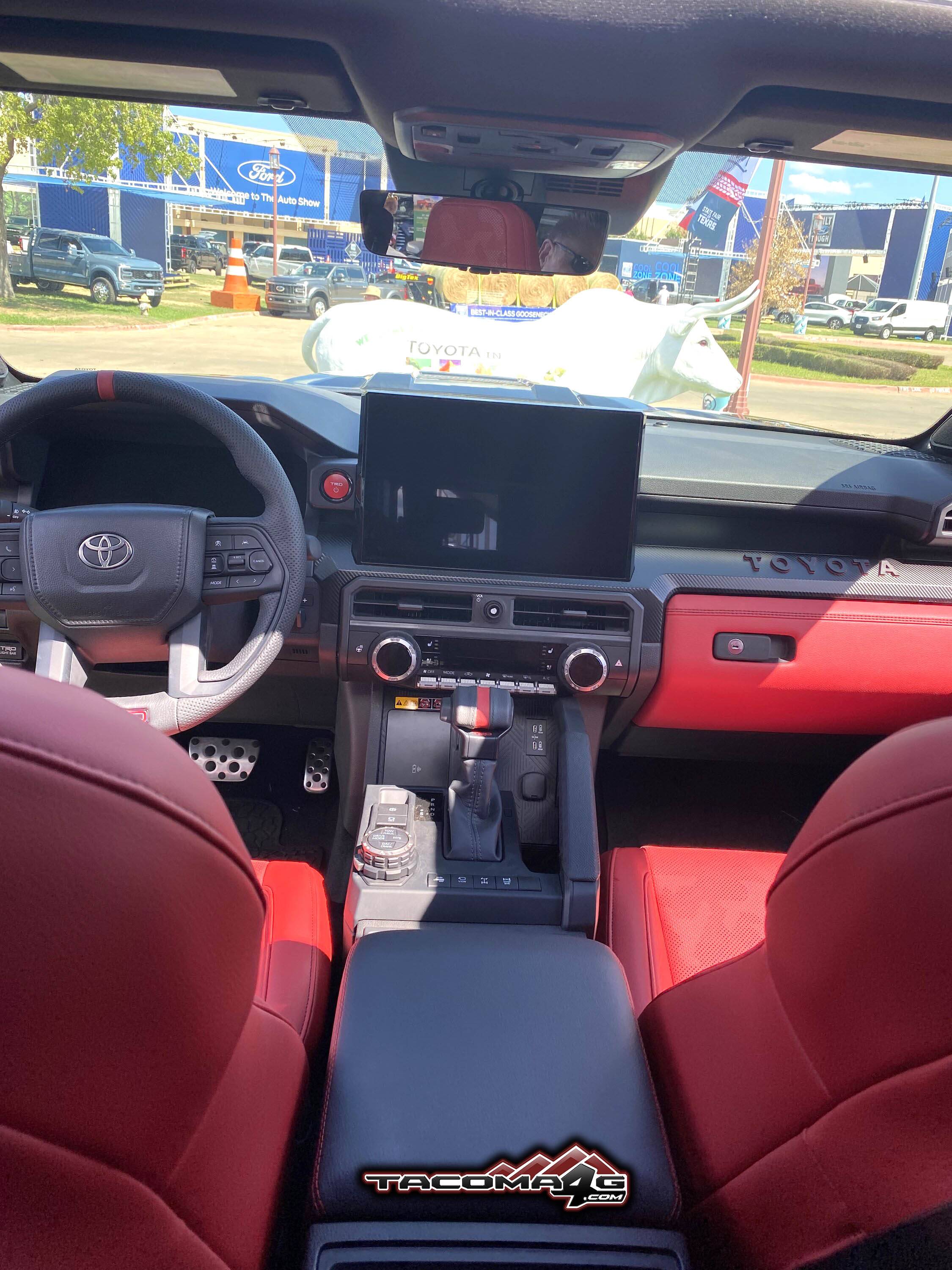 2024 Tacoma 2024 Tacoma TRD Pro @ Texas State Fair BLACK 2024 Tacoma TRD PRO - Red Interior Isodynamic Seats Texas TX State Fair 1