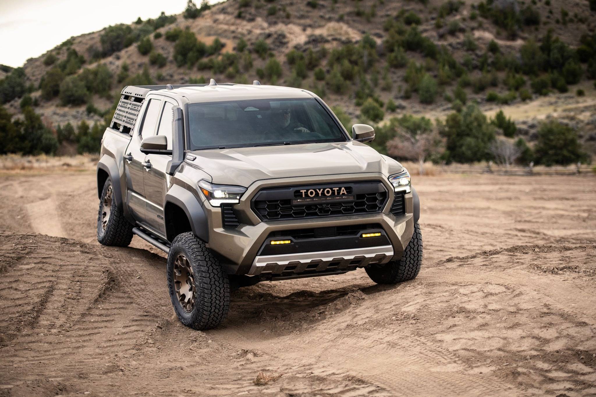 2024 Tacoma XOVERLAND's Tacoma Trailhunter Special Series Starting Feb 19 Bronze Oxide Trailhunter 2024 Tacoma action shots 2