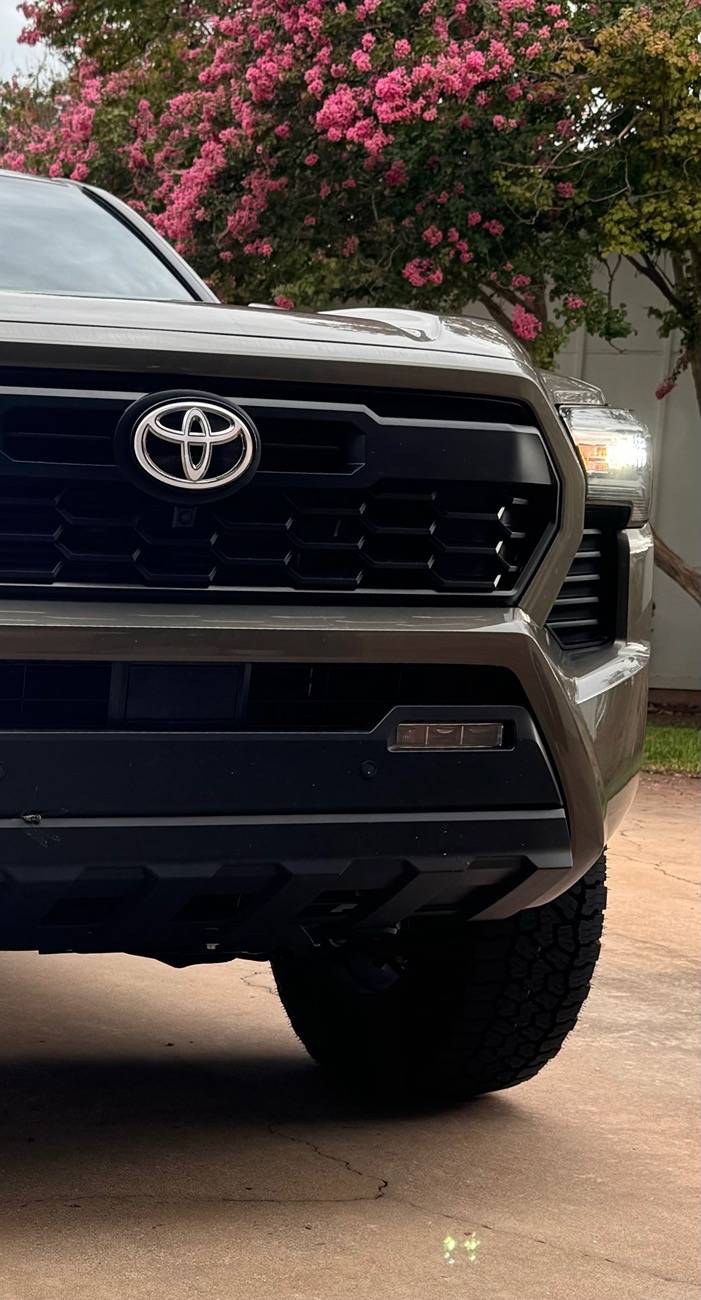 2024 Tacoma Amazing what a tint, tires, and chin tuck will do to these trucks (265/70 R18 Falken Wildpeak A/T4 installed) FullSizeRender