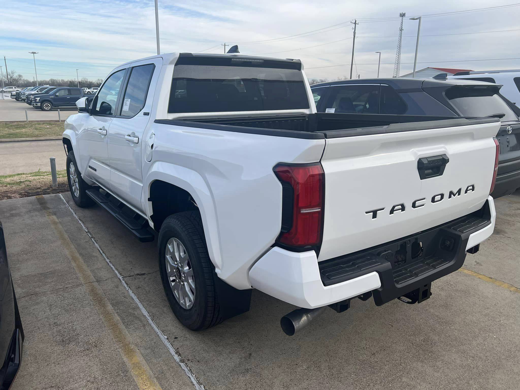 2024 Tacoma Updates of 2024 Tacomas on dealer lots (dealership, pricing, photos)  Ice Cap 2024 Tacoma SR5 interior exterior 2