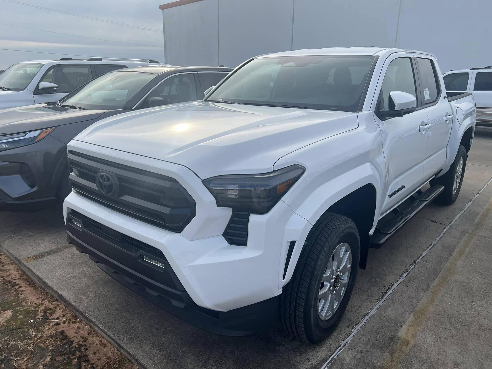 2024 Tacoma Updates of 2024 Tacomas on dealer lots (dealership, pricing, photos)  Ice Cap 2024 Tacoma SR5 interior exterior 3