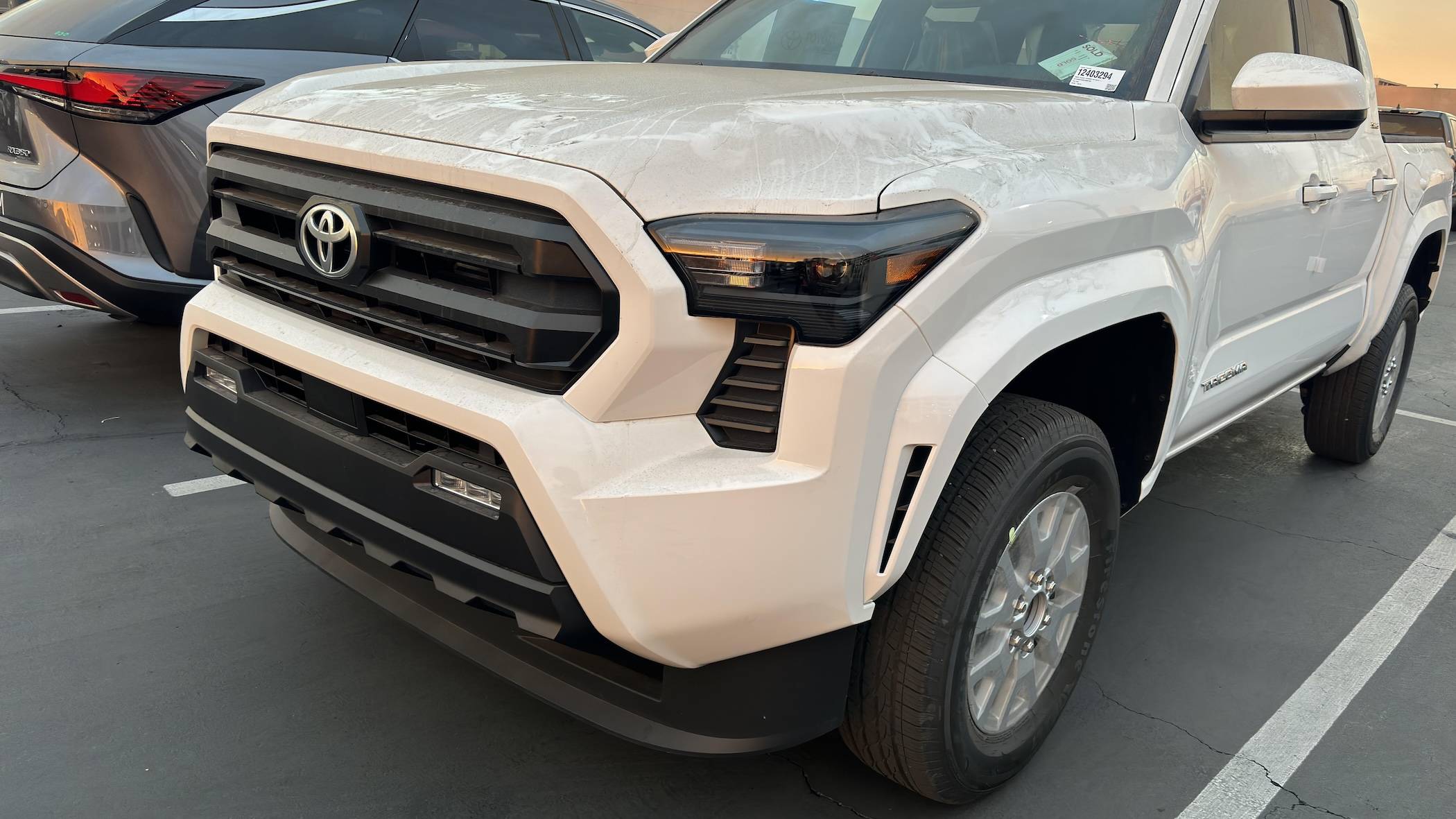 2024 Tacoma Updates of 2024 Tacomas on dealer lots (dealership, pricing, photos) Ice Cap White 2024 Tacoma SR5 1