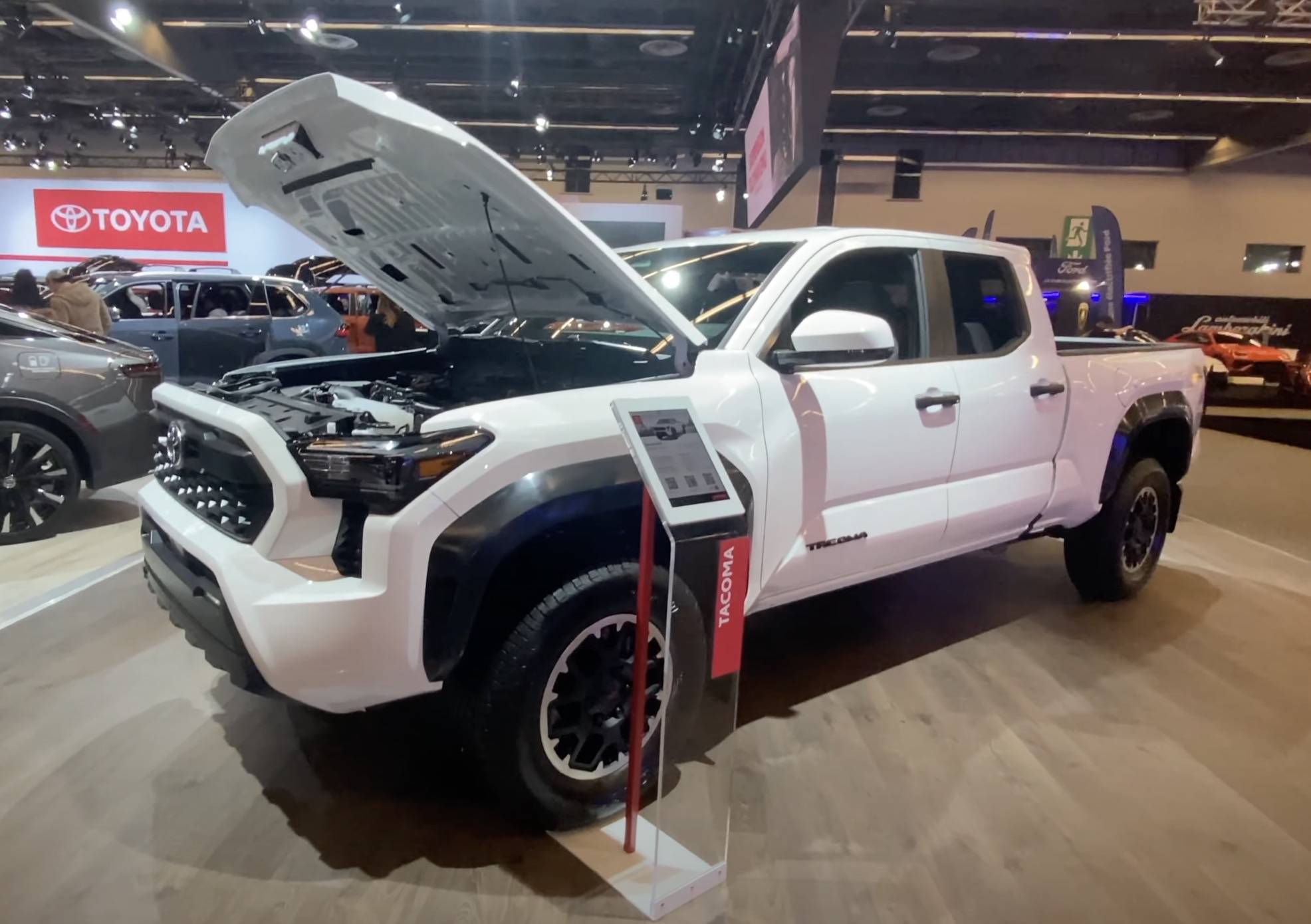 2024 Tacoma Ice Cap White 2024 Tacoma Off-Road - inside/out at Montreal Auto Show Ice Cap White 2024 Tacoma TRD Off-Road Model