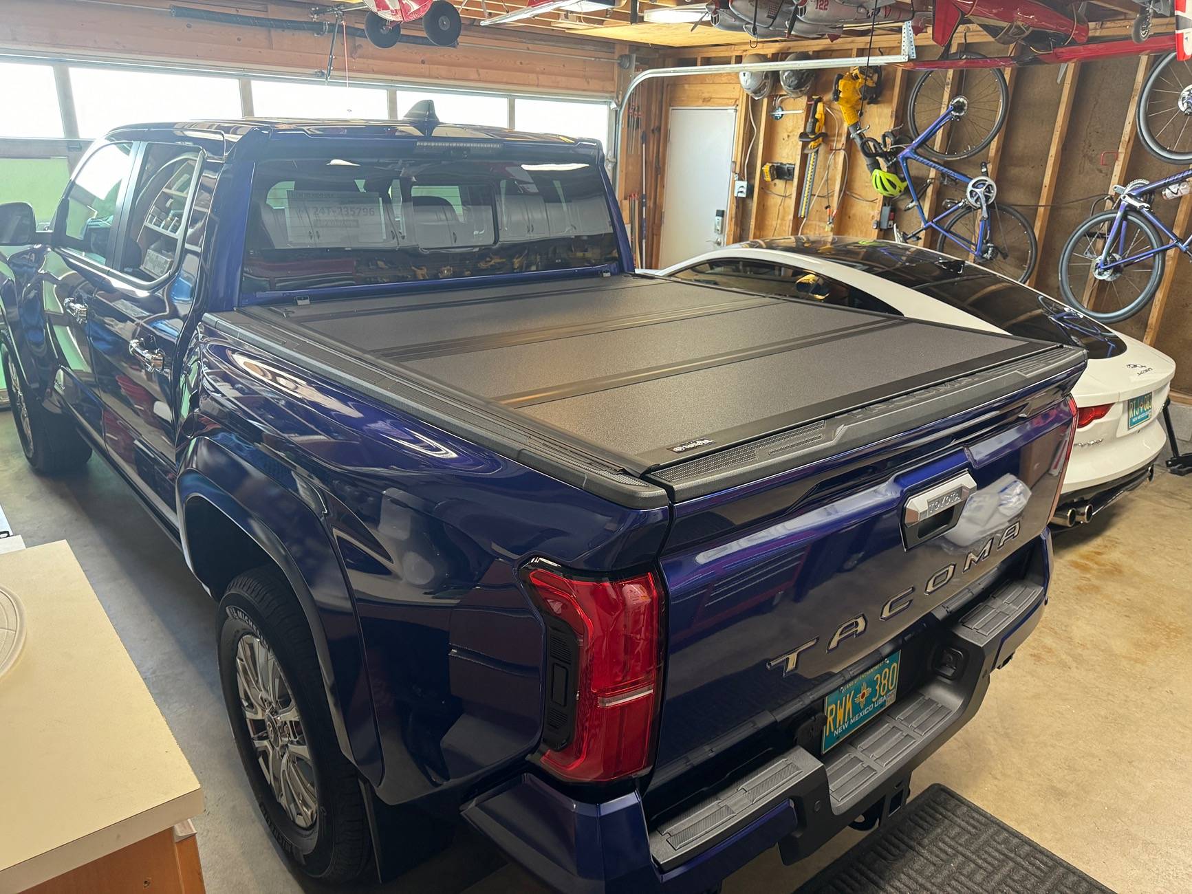 2024 Tacoma OEM Trifold Hard Tonneau Cover PT954-35240 installed on 2024 Tacoma IMG_2200