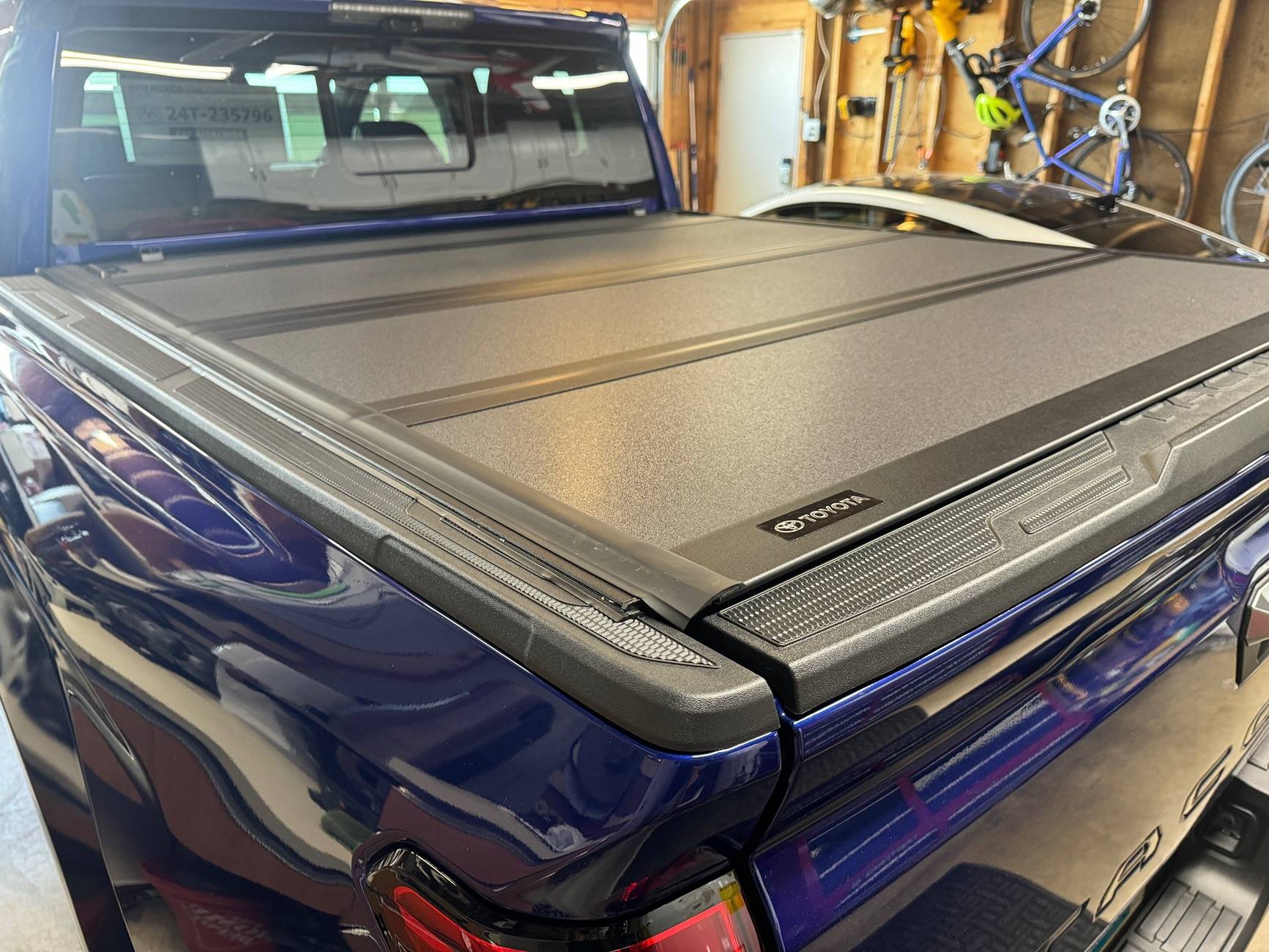 2024 Tacoma OEM Trifold Hard Tonneau Cover PT954-35240 installed on 2024 Tacoma IMG_2201