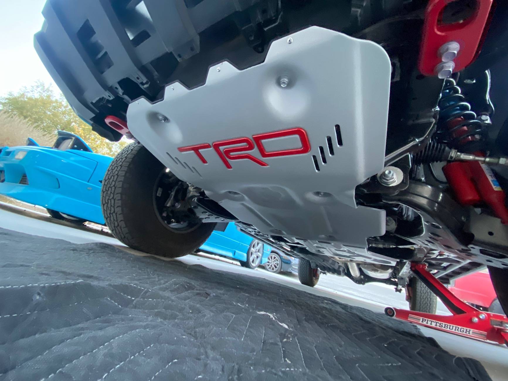 2024 Tacoma TRD Pro Front Skid Plate Paired To Trailhunter Transfer Case Skid Plate IMG_2893