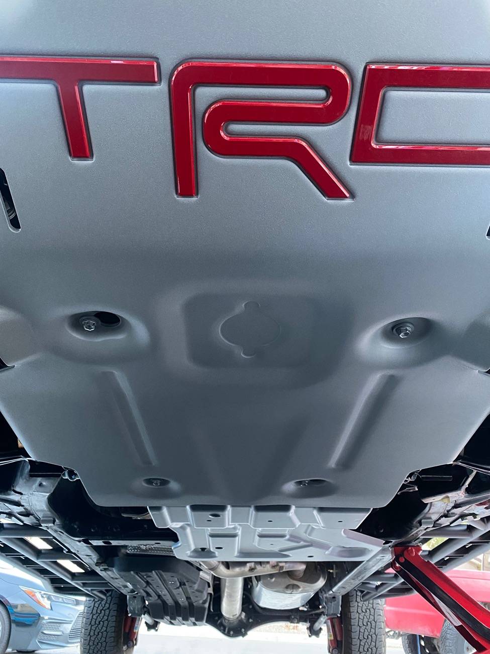 2024 Tacoma TRD Pro Front Skid Plate Paired To Trailhunter Transfer Case Skid Plate IMG_2896