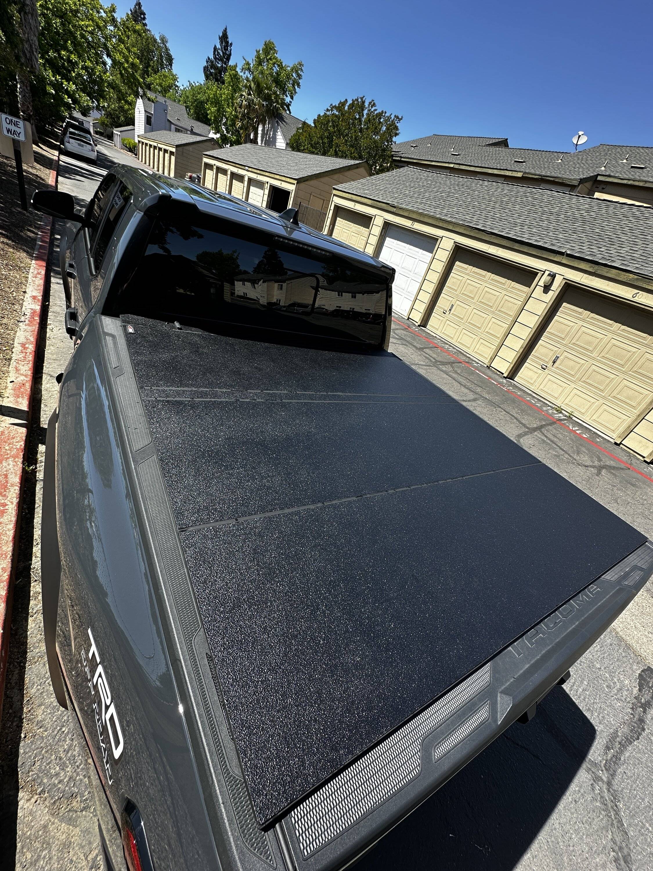 2024 Tacoma LoMax Stance hard tri fold tonneau cover installed IMG_2927.JPG