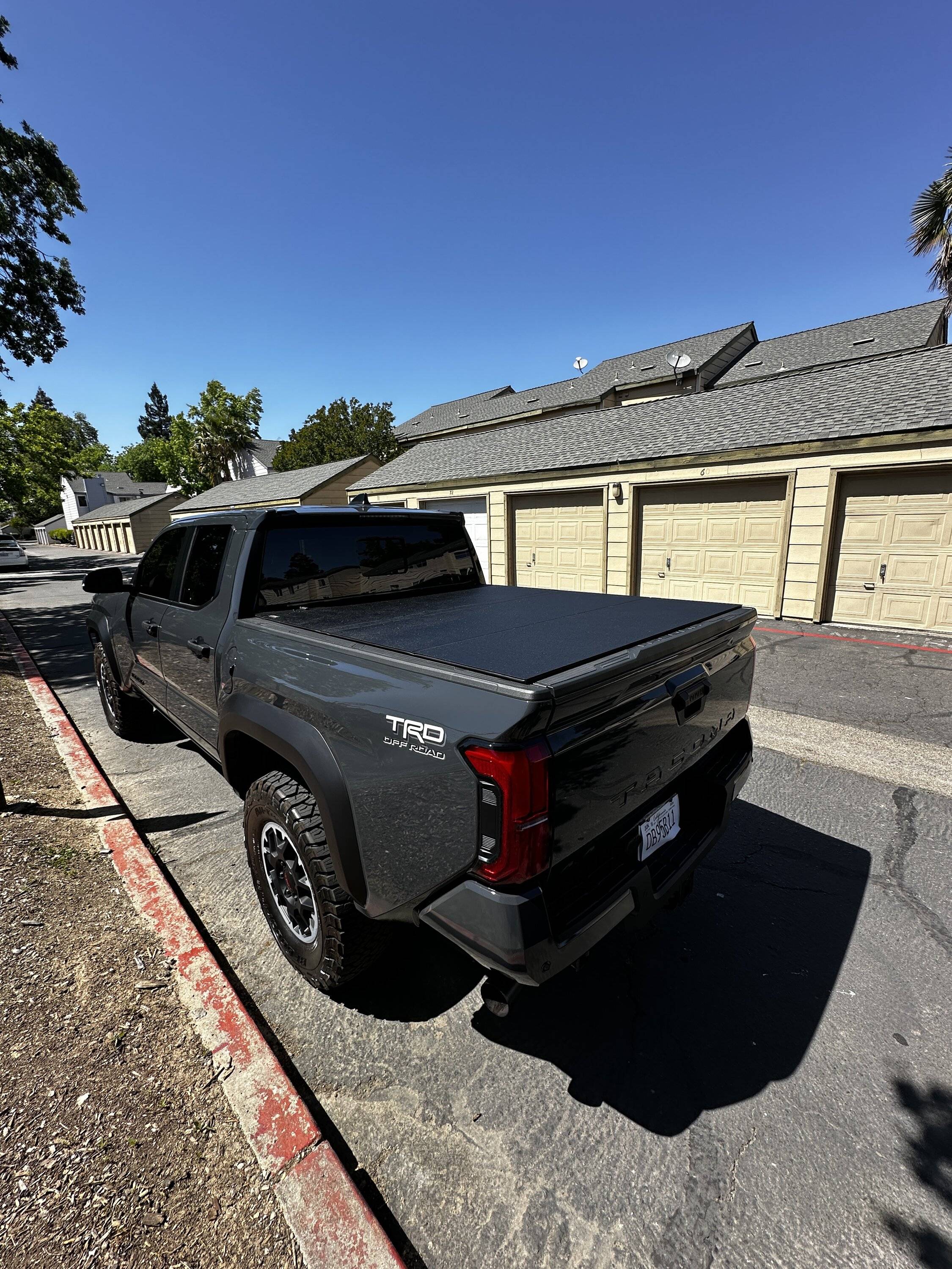 2024 Tacoma LoMax Stance hard tri fold tonneau cover installed IMG_2928.JPG