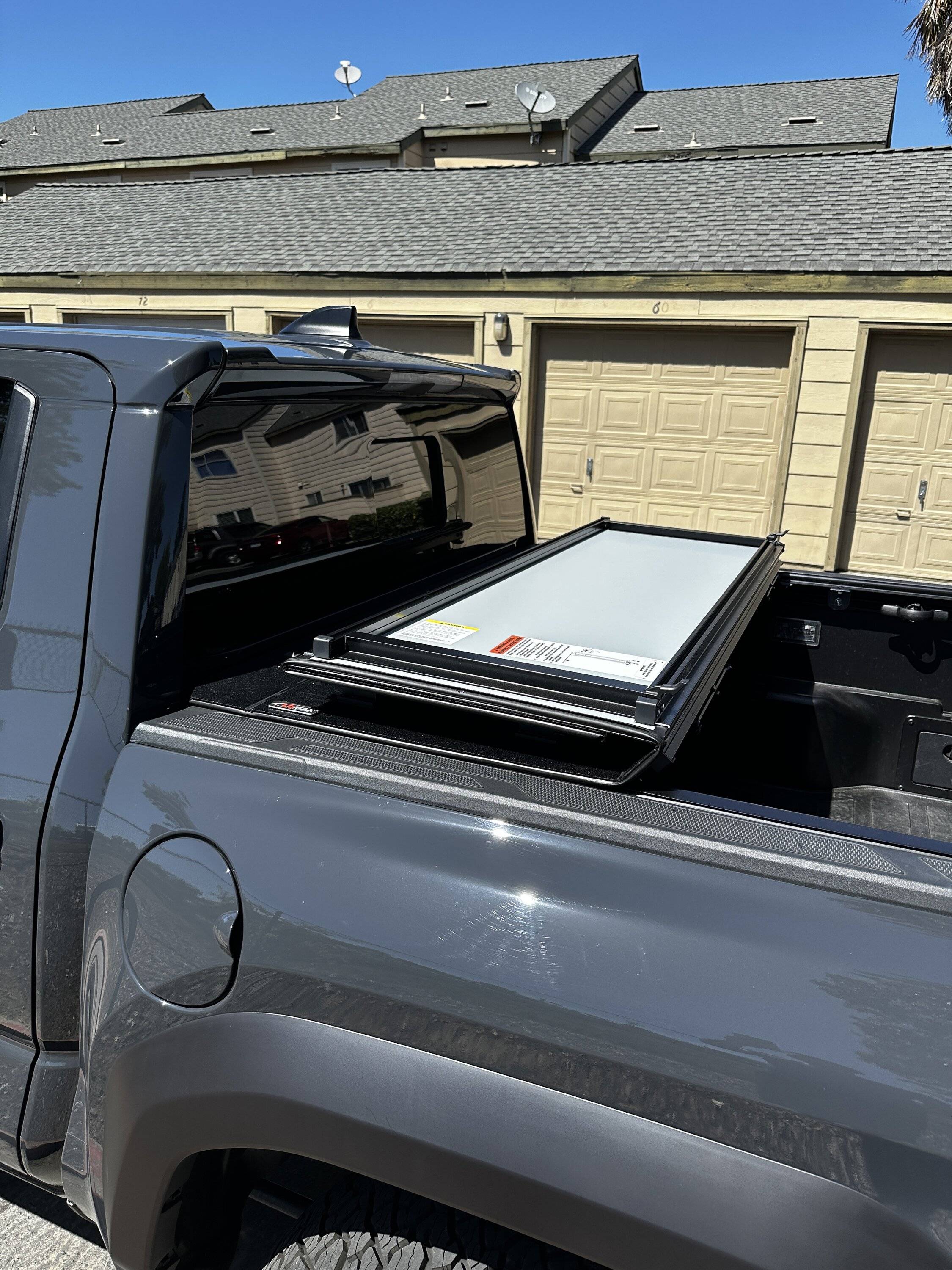 2024 Tacoma LoMax Stance hard tri fold tonneau cover installed IMG_2931.JPG