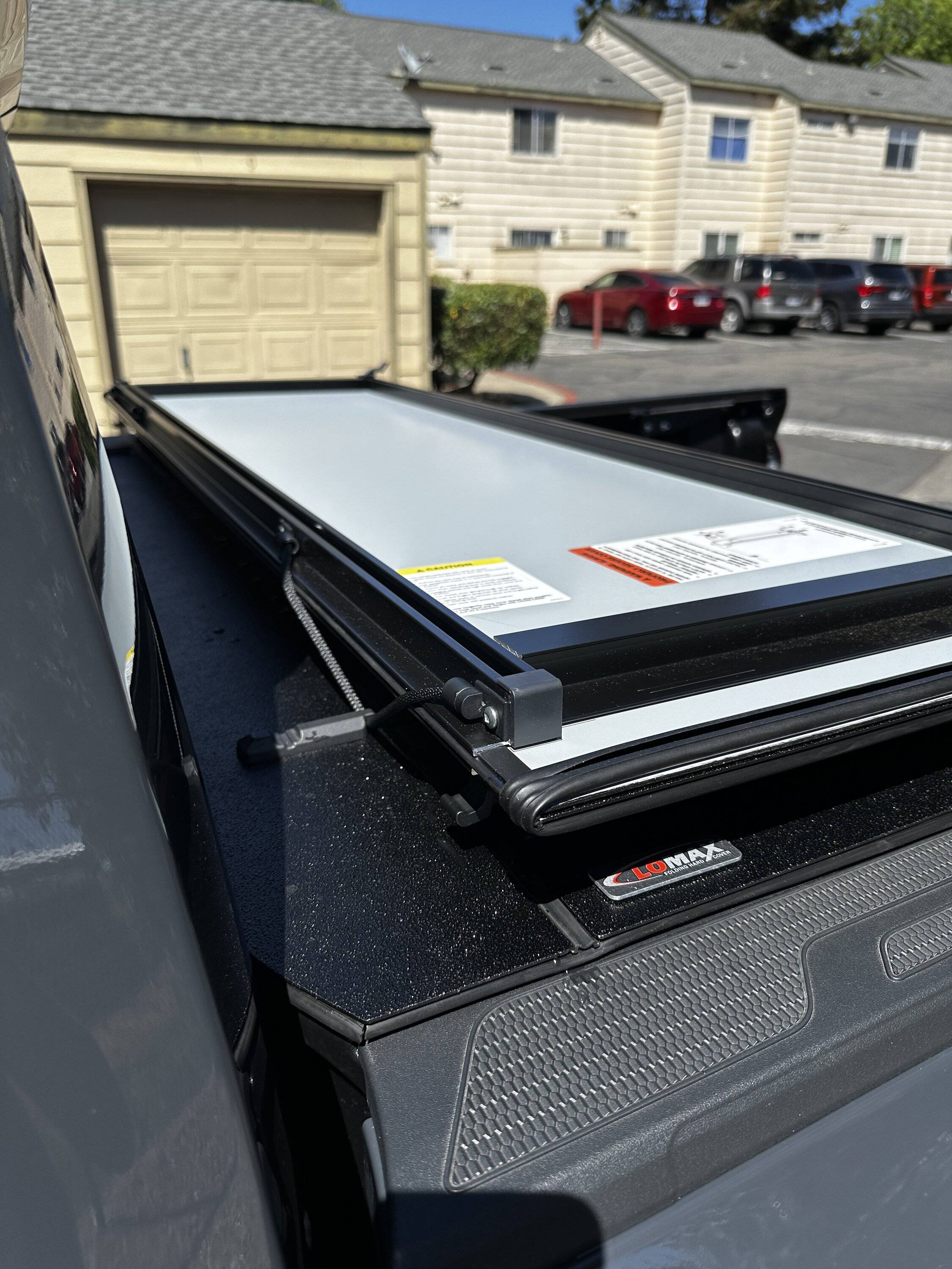 2024 Tacoma LoMax Stance hard tri fold tonneau cover installed IMG_2934.JPG