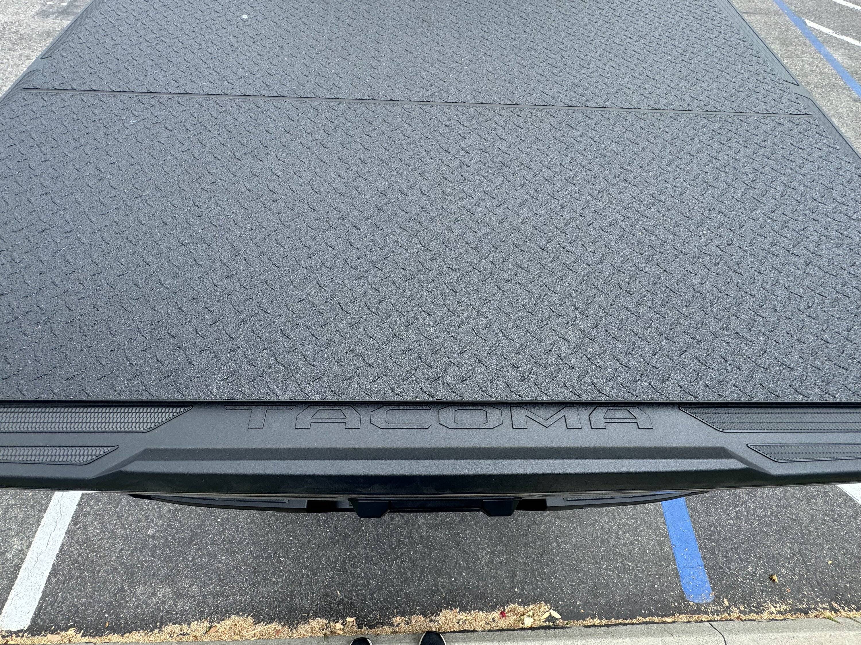 2024 Tacoma LOMAX Stance Hard Tri-Fold Tonneau Cover Scratching Paint IMG_3811