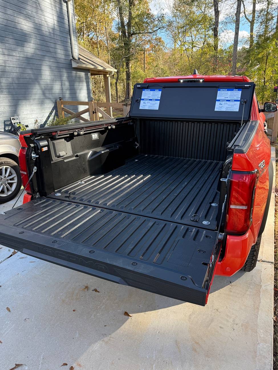 2024 Tacoma OEM Trifold Hard Tonneau Cover PT954-35240 installed on 2024 Tacoma IMG_3970