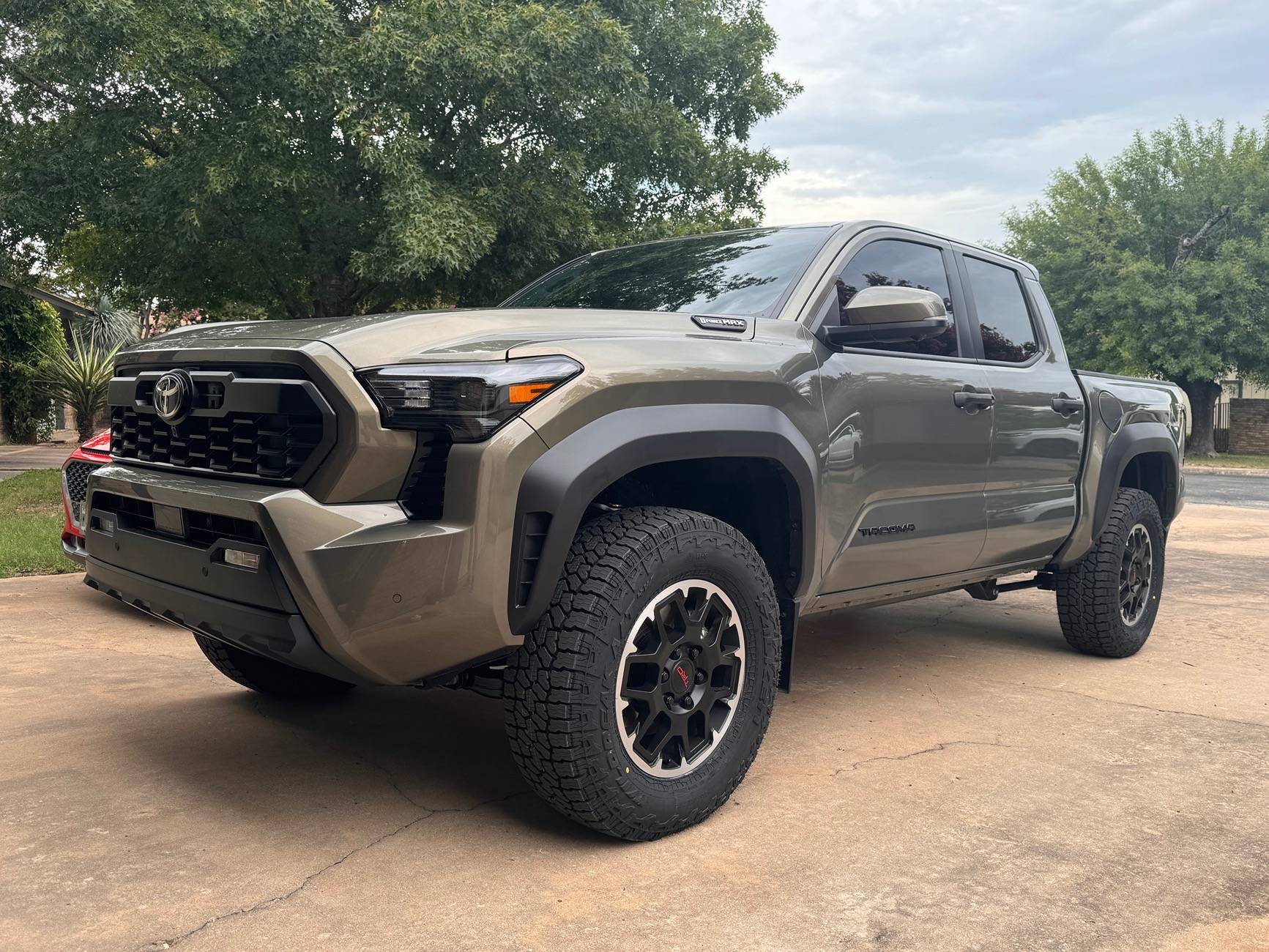 2024 Tacoma Amazing what a tint, tires, and chin tuck will do to these trucks (265/70 R18 Falken Wildpeak A/T4 installed) IMG_4788