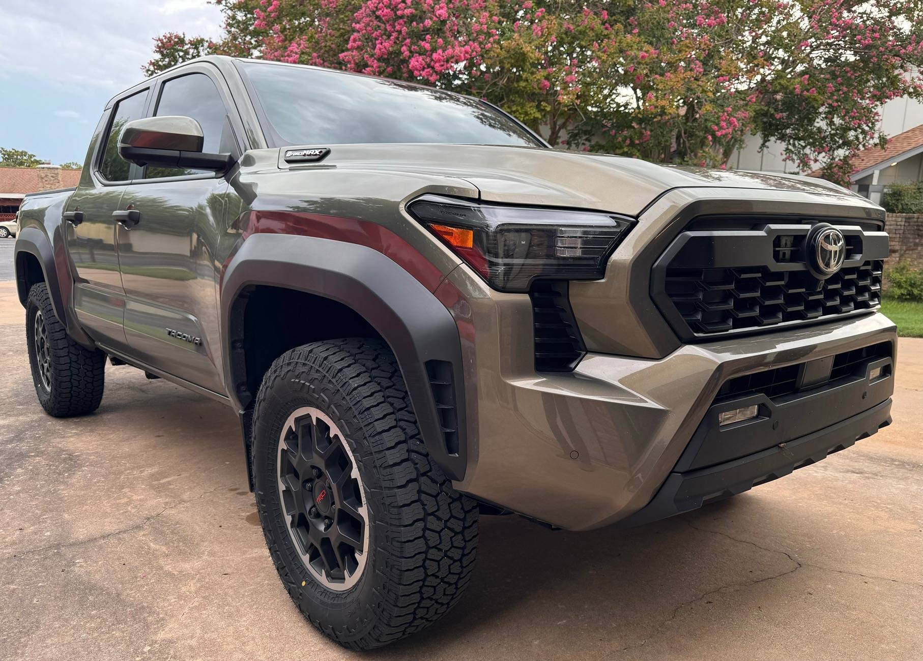 2024 Tacoma Amazing what a tint, tires, and chin tuck will do to these trucks (265/70 R18 Falken Wildpeak A/T4 installed) IMG_4806