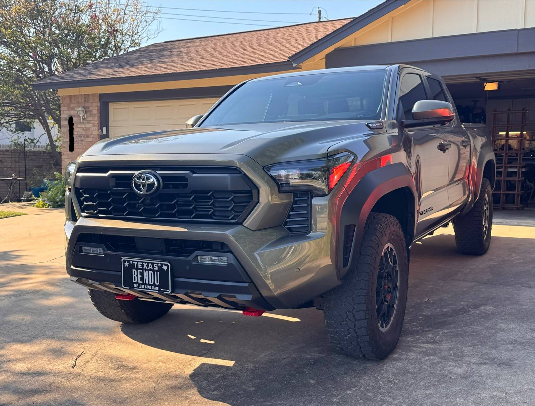 2024 Tacoma Amazing what a tint, tires, and chin tuck will do to these trucks (265/70 R18 Falken Wildpeak A/T4 installed) IMG_4979