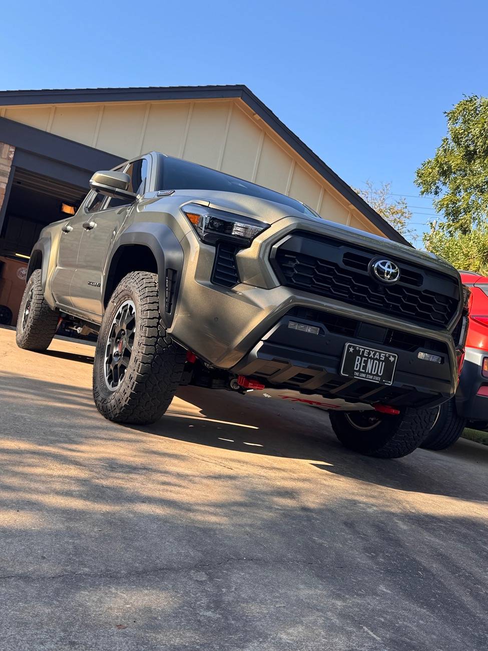 2024 Tacoma Amazing what a tint, tires, and chin tuck will do to these trucks (265/70 R18 Falken Wildpeak A/T4 installed) IMG_4981