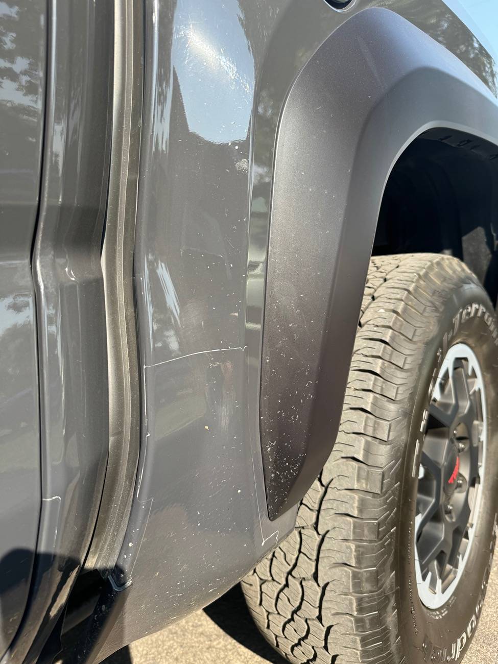 2024 Tacoma Skinny Mudflaps = Rock Chips on Bed & Fender Flares IMG_5540