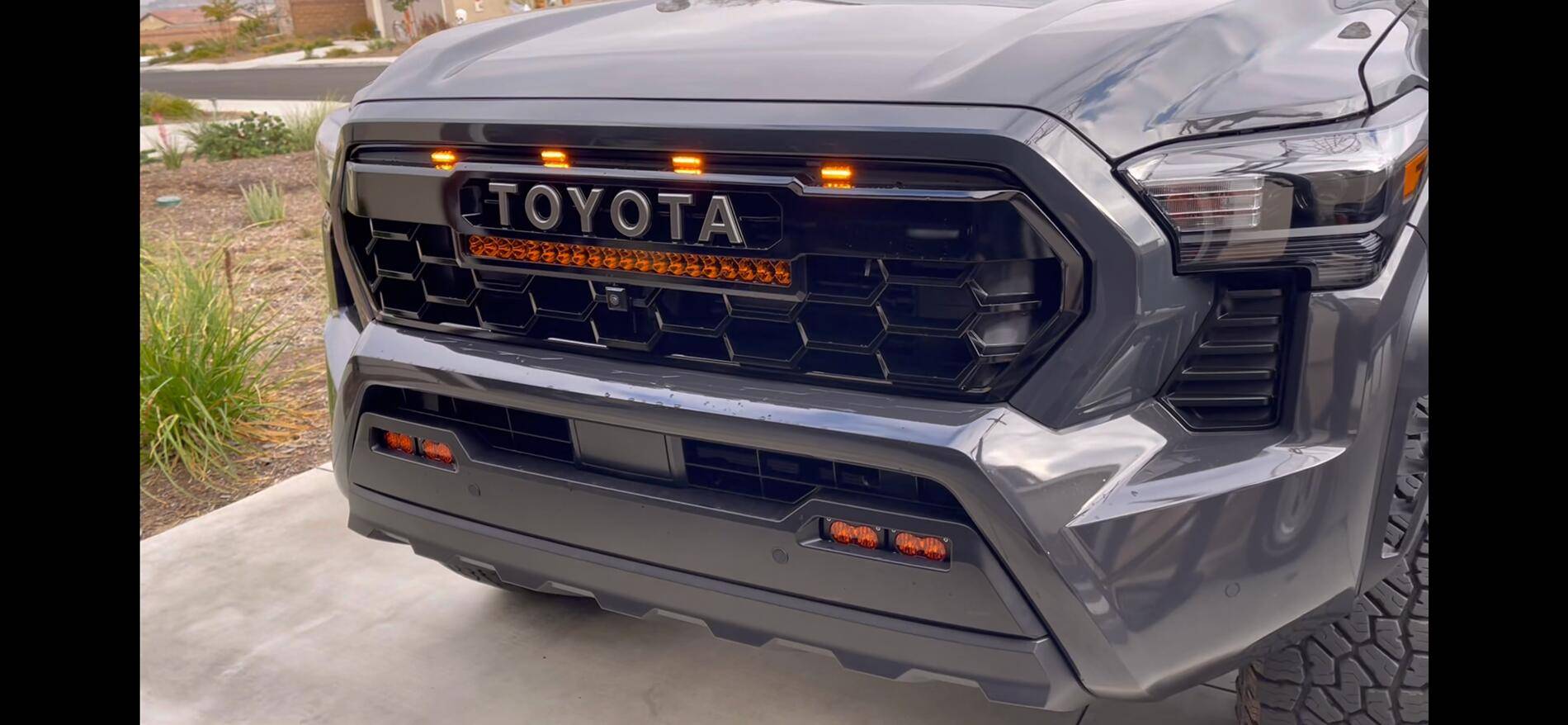 2024 Tacoma Installed Heretic light bar, Baja fog lights & Raptor lights in 2024 Tacoma TRD Pro grill IMG_6039