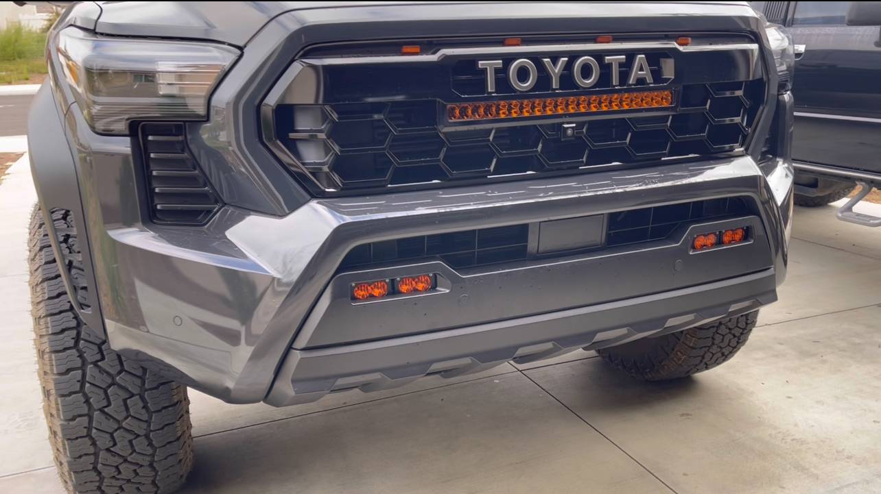 2024 Tacoma Installed Heretic light bar, Baja fog lights & Raptor lights in 2024 Tacoma TRD Pro grill IMG_6047