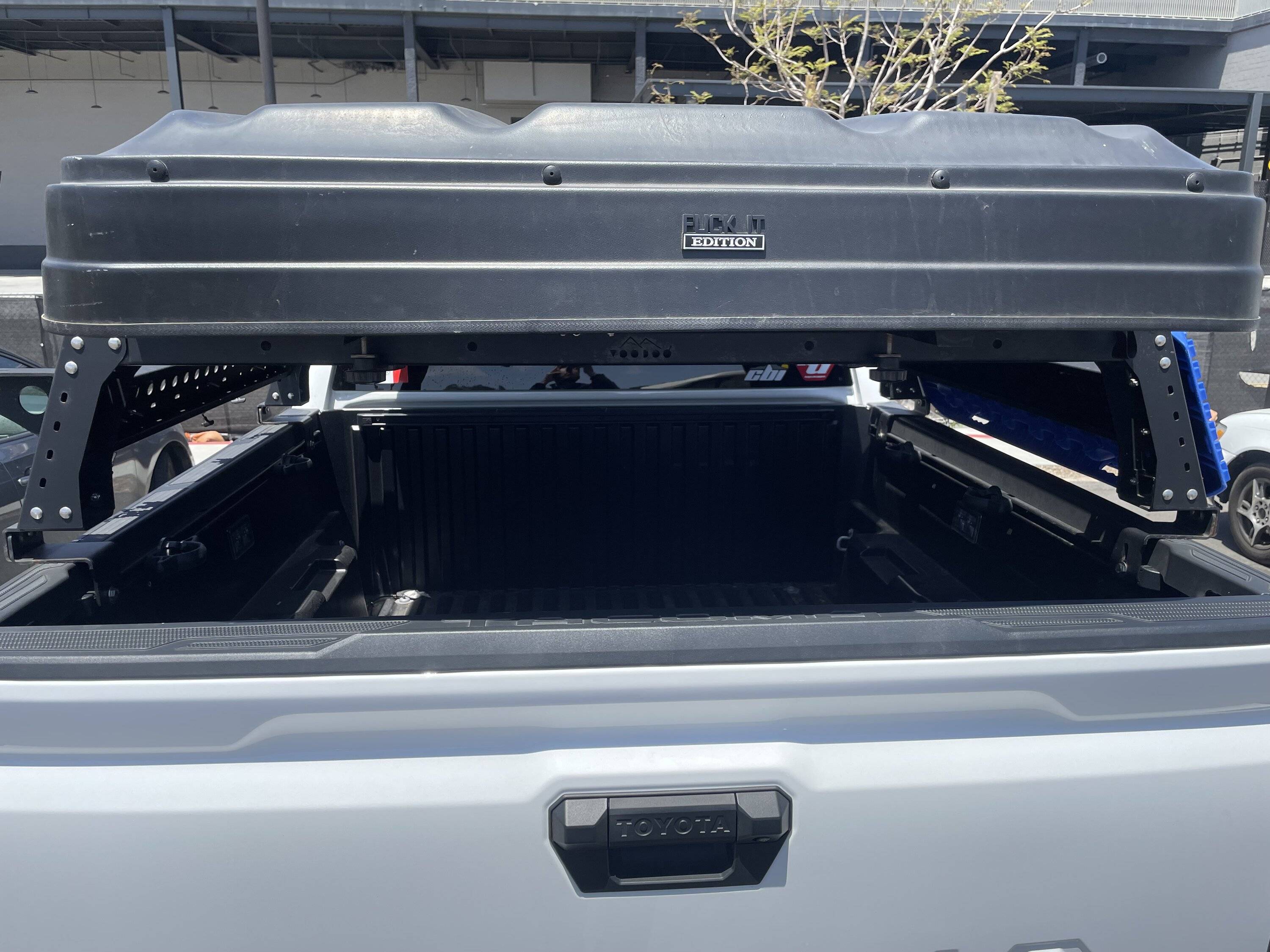 2024 Tacoma Looking for a bed/tonneau cover for the 5ft bed. one that works with my bed rack adapters and that won’t break the bank. What are yall using for cover IMG_8262