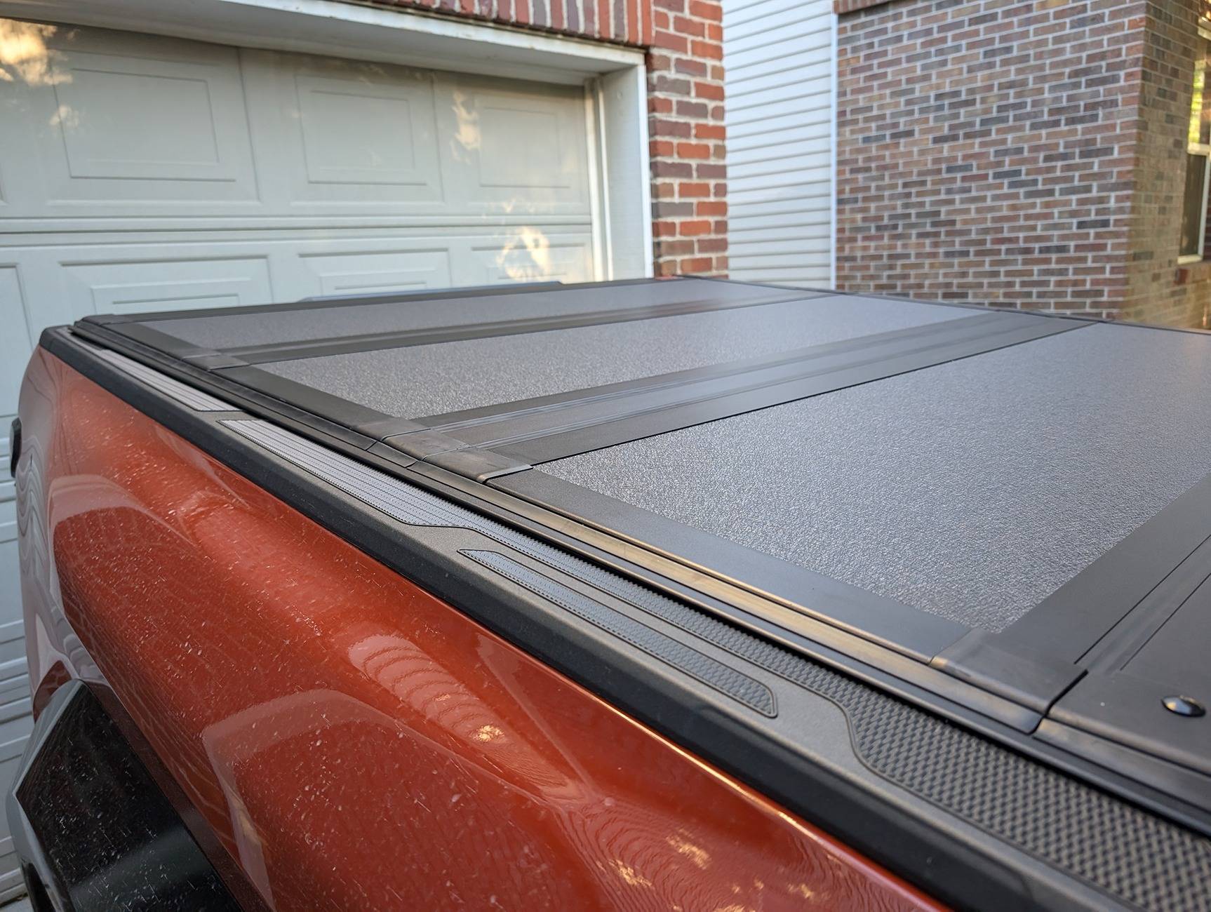 2024 Tacoma Rough Country Hard Flip Up Tonneau Cover installed on Tacoma TRD Pro PXL_20240824_003718559.MP