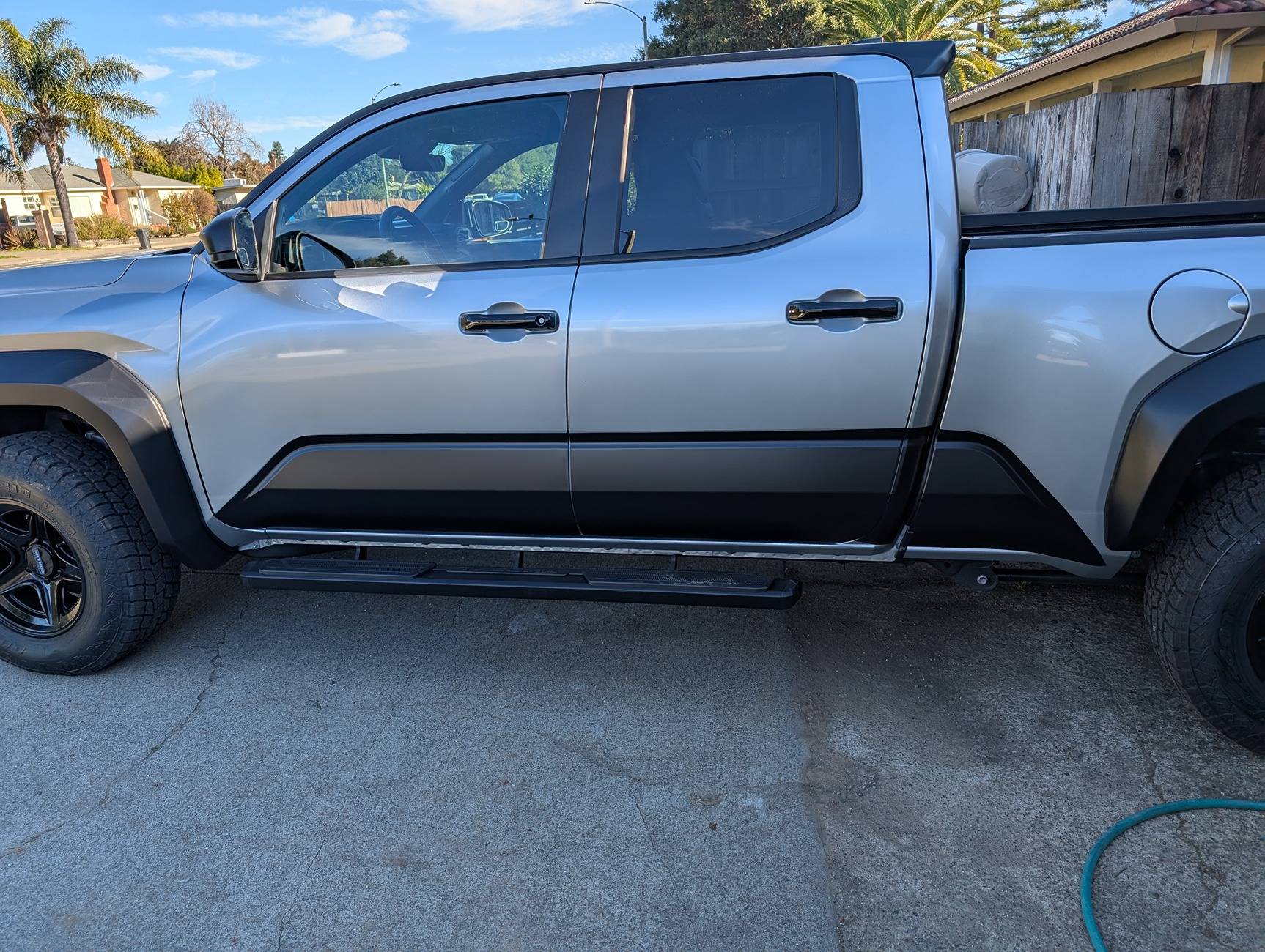 2024 Tacoma Gloss black mirror covers and door handle covers installed PXL_20250114_222453344