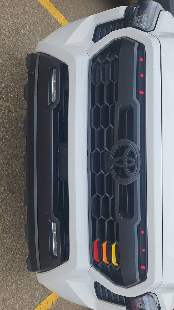 2024 Tacoma Square or round amber marker lights (raptor lights) for grille? Snapchat-1810620546