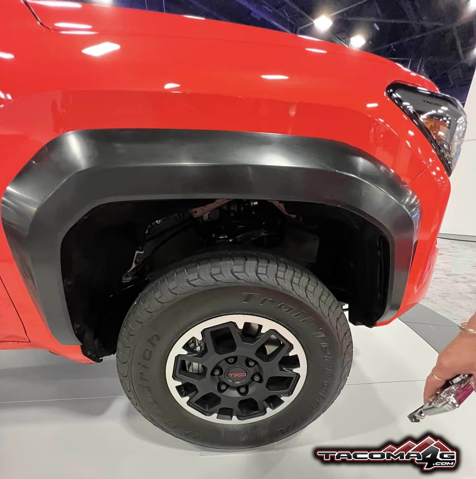 2024 Tacoma 📸 2024 Tacoma TRD Off-Road's first car show (exterior, interior, cloth seats pics from Miami Autoshow 2023) Solar Octane 2024 Toyota Tacoma TRD Off-Road Miami Auto Show 16