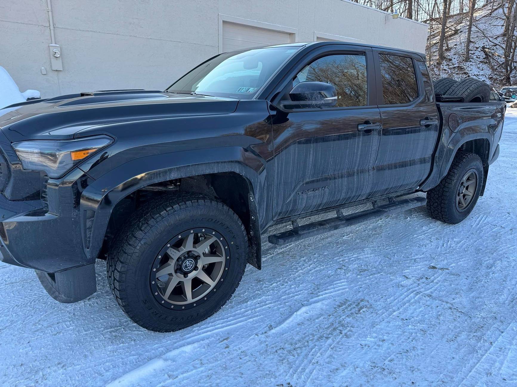 2024 Tacoma TRD Sport with 265/70/R18 Falken WildPeak AT4Ws on ICON Alloys Rebounds (no lift) tacobronz