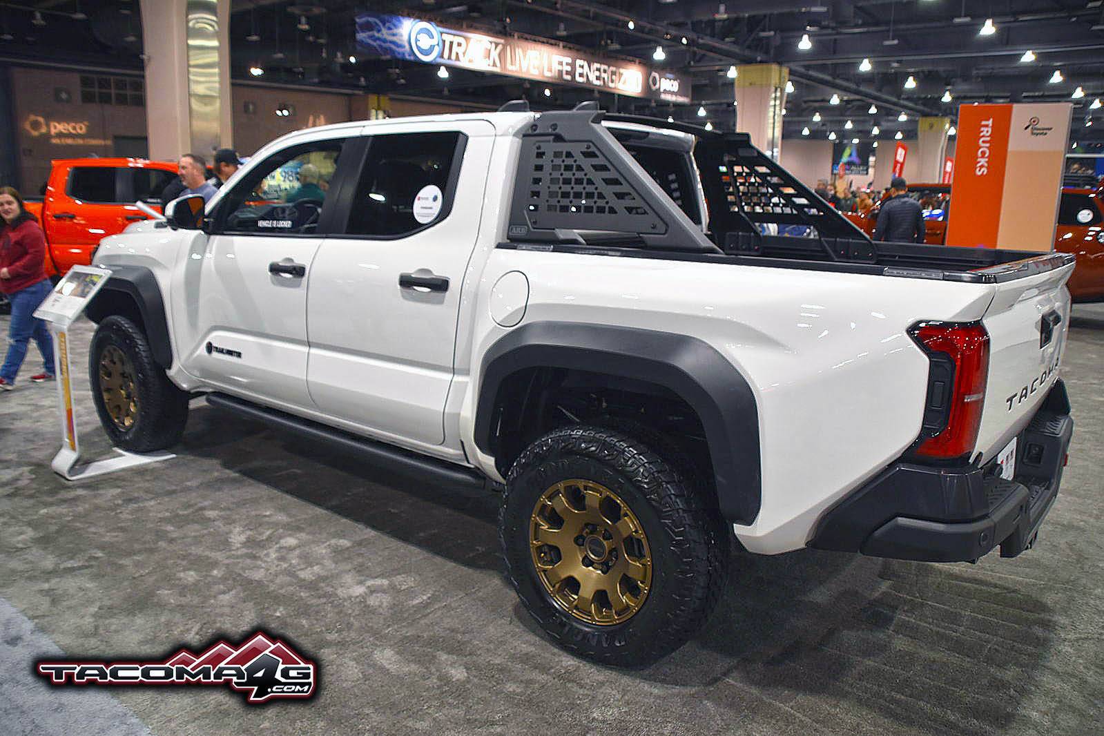 2024 Tacoma 2024 Tacoma TRAILHUNTER - Specs, Price (TBA) Features, Photos & Videos White Wind Chill Pearl 2024 Tacoma Trailhunter @ Philadelphia Auto Show5