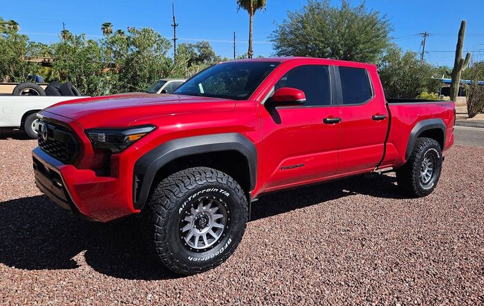 Supersonic Red TRD Off-Road on 17" Icon Wheels, BFG KO3 315/70 Tires, Lift Kit