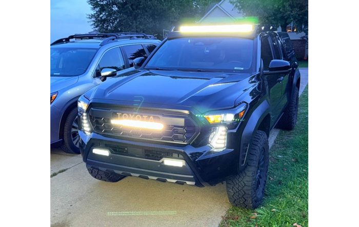 Installed TrailHunter grille with Heretic light bar and DRL lights on TRD OR